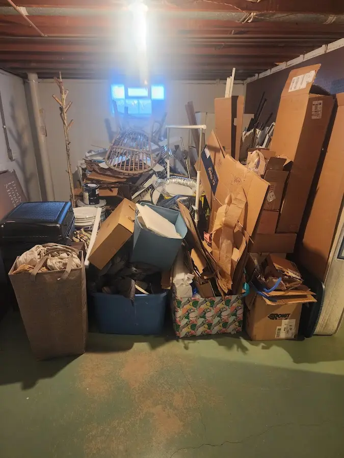 Roll-off dumpster container at job site for Yard Waste Dumpster Rental in Upper Freehold